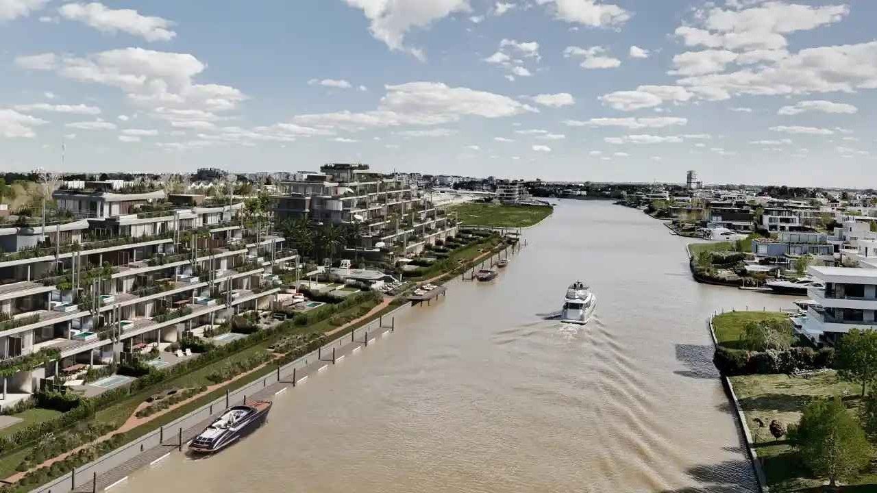 Ilustración de edificios aterrazados en construcción junto a un canal, con áreas verdes y amarras.